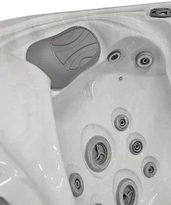 A seat in the Beta 523 hot tub, which offers a shoulder massage.