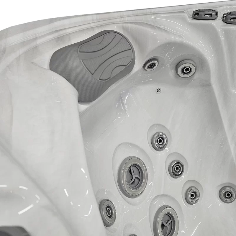 A seat in the Beta 523 hot tub, which offers a shoulder massage.