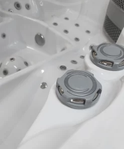 Buttons for adjusting the power of the massage nozzles in the Alpha 823 massage pool.